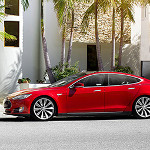 Electric-Car Pioneer Elon Musk Charges Head-On at Detroit